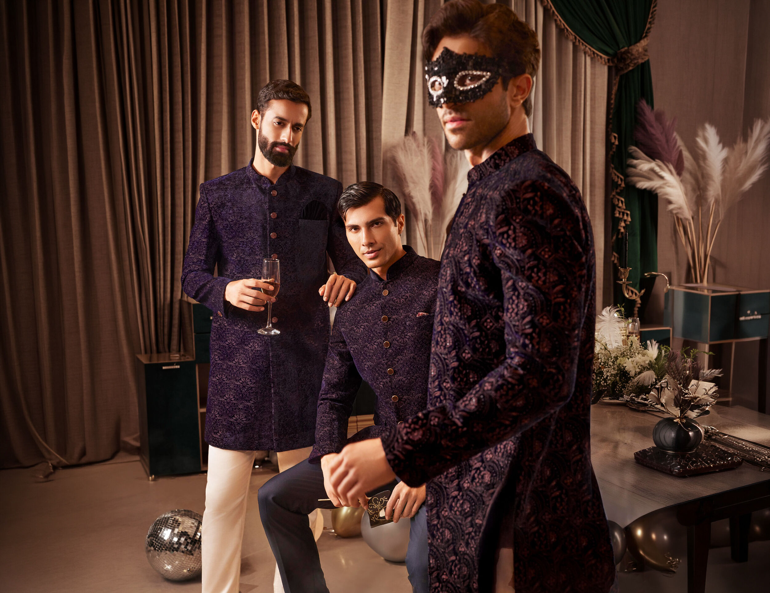 Man wearing a Jodhpuri suit with matching trousers, posing against a neutral background.